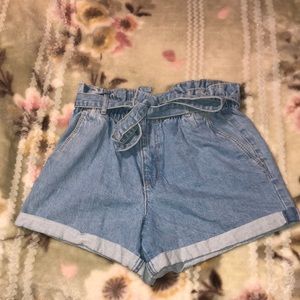Light blue denim high waisted shorts with removable belt in same style. Size 7